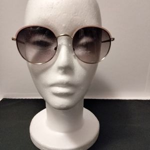 Nosiz Nodim. Round, nude Glasses.